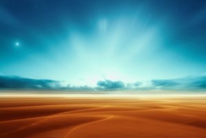 A desert of rippling dunes.